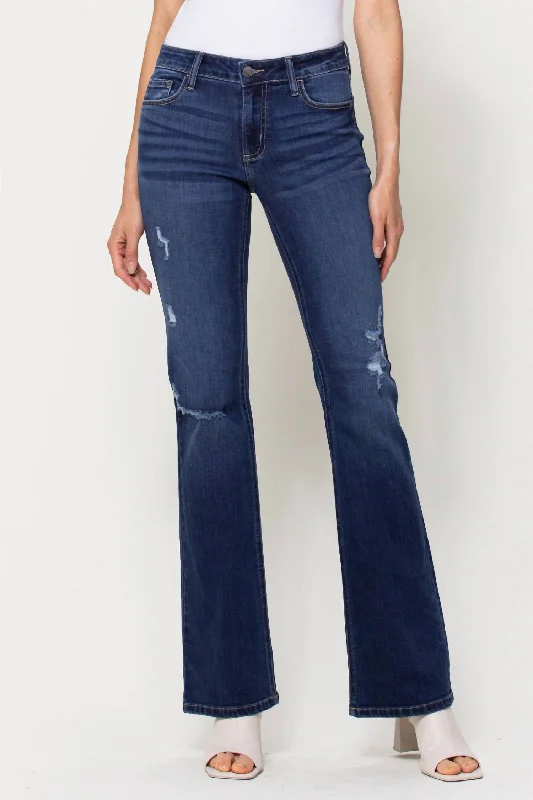 Women’s straight-leg pants for timeless fashion -Mid Rise Distressed Flare Jeans In Medium Wash