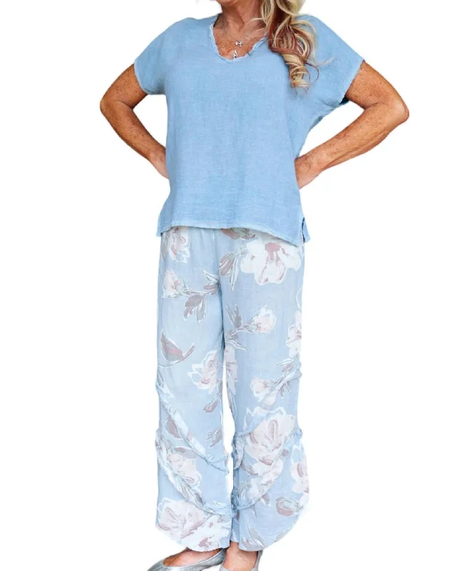 Women’s button-front pants for casual days -Floral Linen Pants With Ruffle Detailed Leg In Dusty Blue