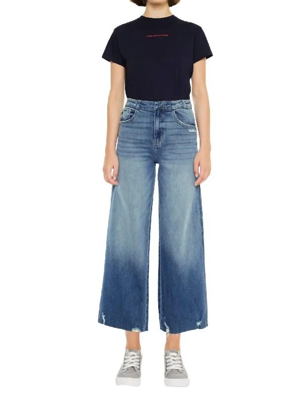 Women’s tapered pants for sleek look -High Rise Cropped Wide Leg Jeans In Medium